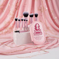 Bella Beauté 10-piece mini makeup brush set with pink handles and black bristles, displayed with a pink travel case.