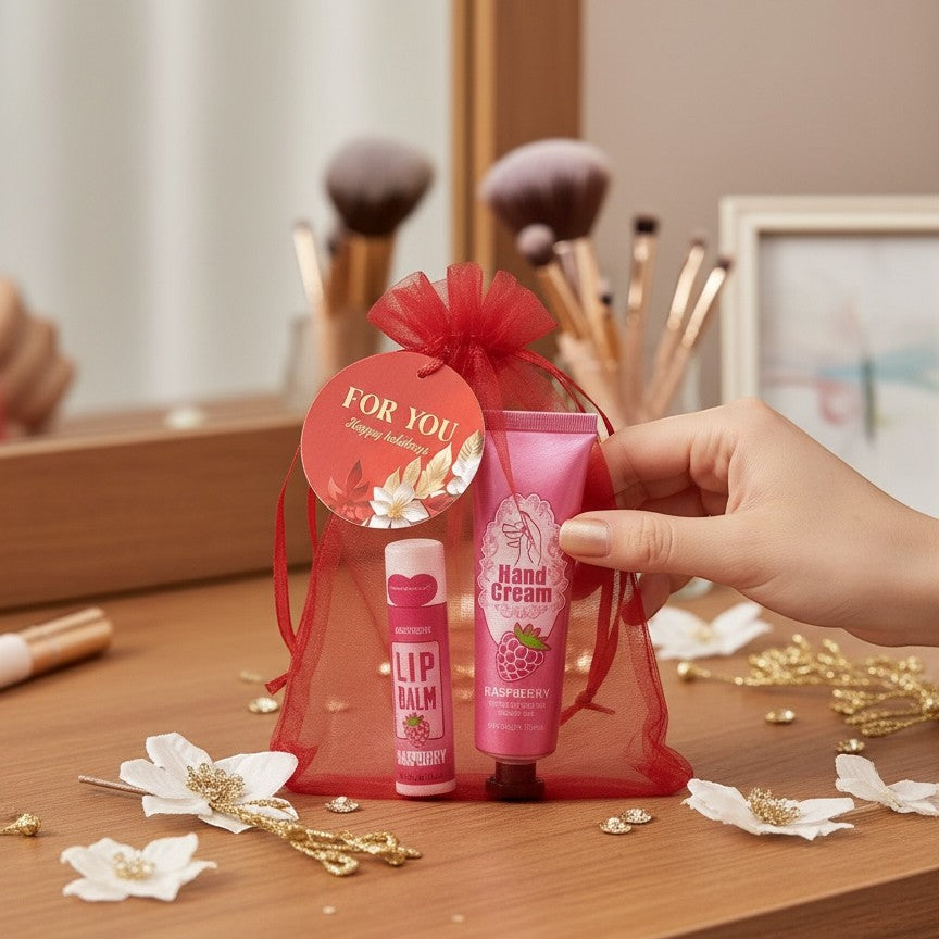 Bella Beauté Raspberry Hand Cream & Lip Balm Duo Set in a sheer red gift bag. Perfect for gifting.