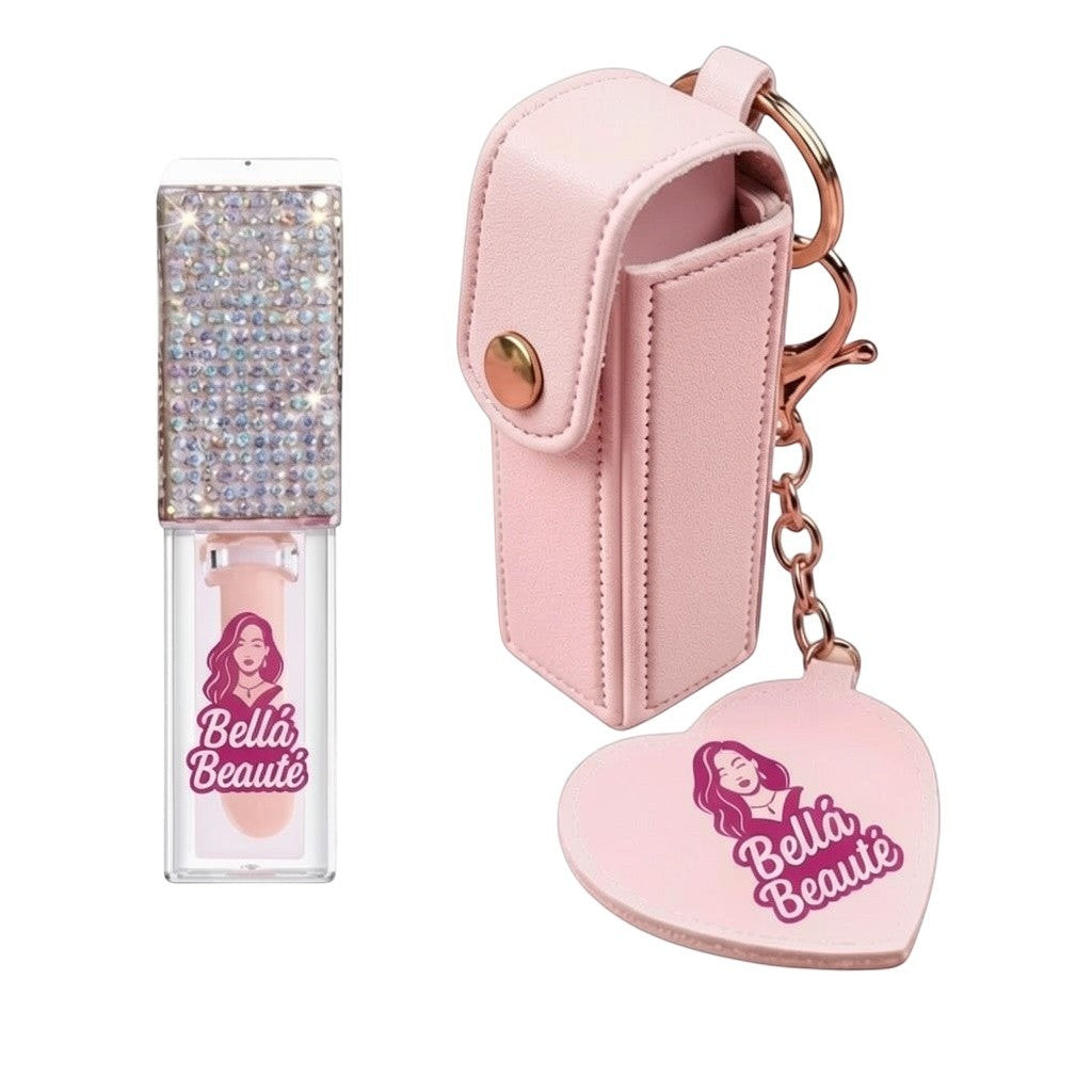 Bella Beauté magic color-changing lip oil with keychain, adorned with rhinestones, in a pink holder.