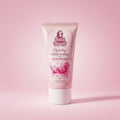 Bella Beauté Silky Touch Hydrating Hand Lotion in Soft Rosy Blush Scent, pink tube with rose graphics.