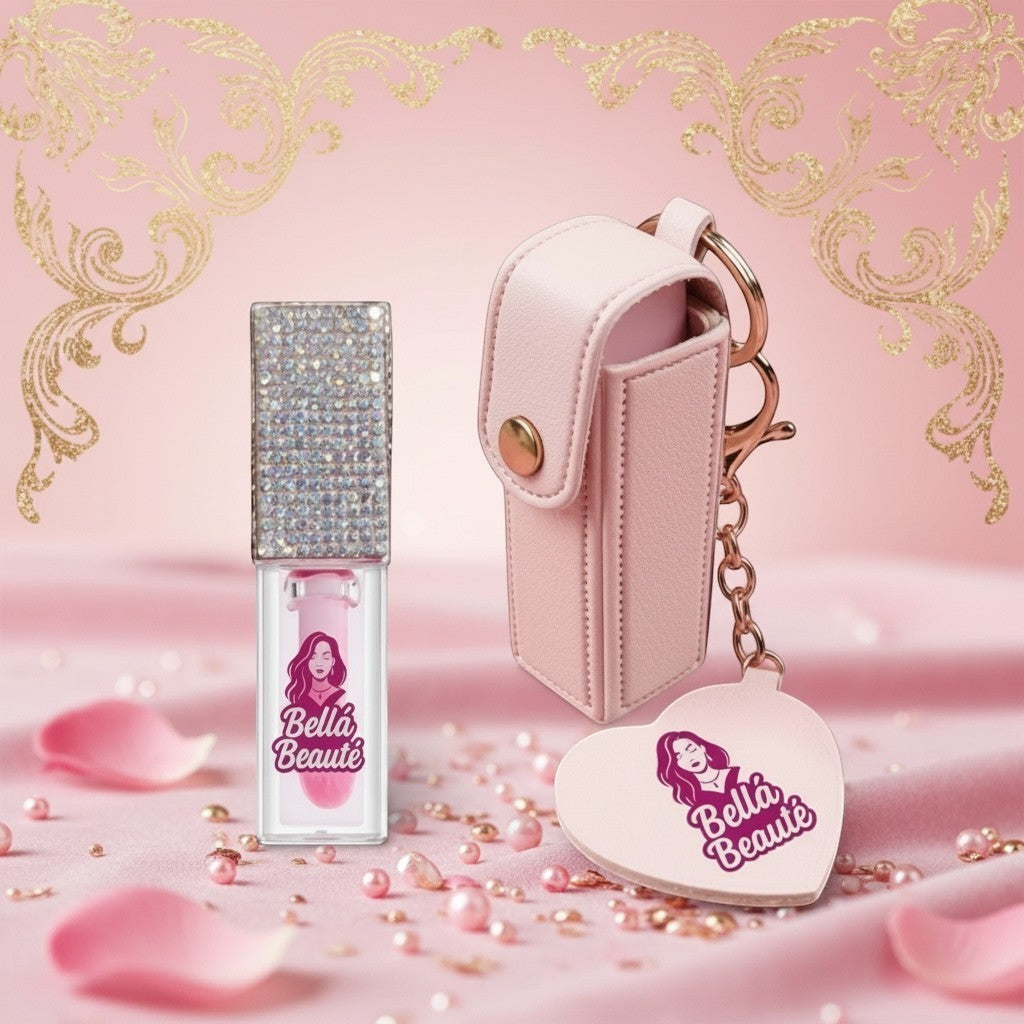 Bella Beauté magic color-changing lip oil with rhinestone cap and pink keychain holder with heart charm.