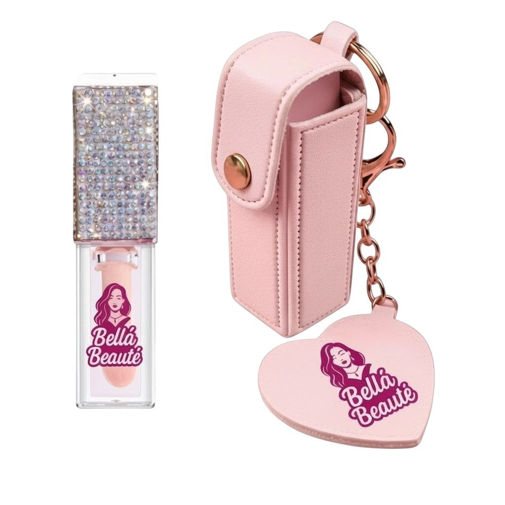 Bella Beauté magic color-changing lip oil with rhinestone-embellished cap and pink keychain holder.
