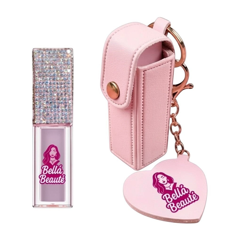 Bella Beauté magic color-changing lip oil with rhinestone-encrusted cap and pink keychain holder with heart charm.