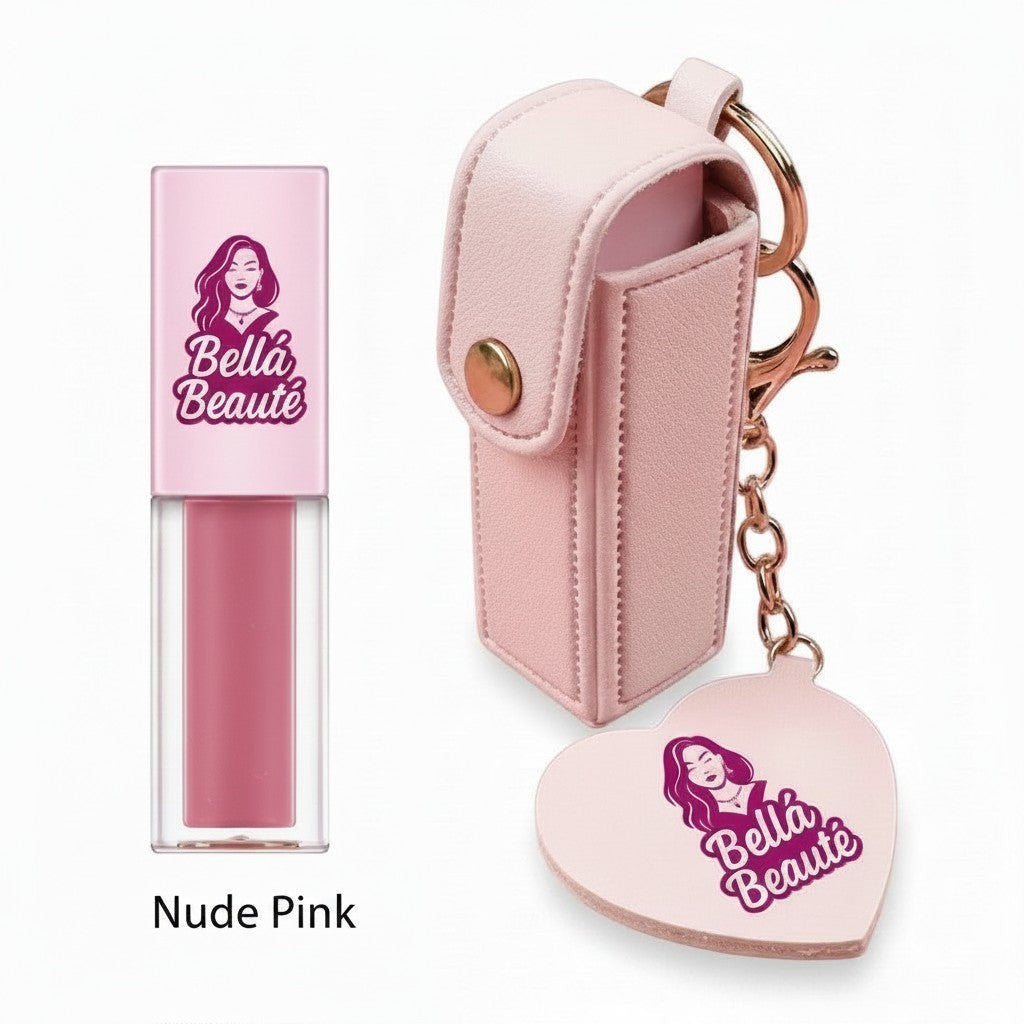 Bella Beauté Nude Pink lip oil with a pink keychain holder and heart-shaped mirror charm.