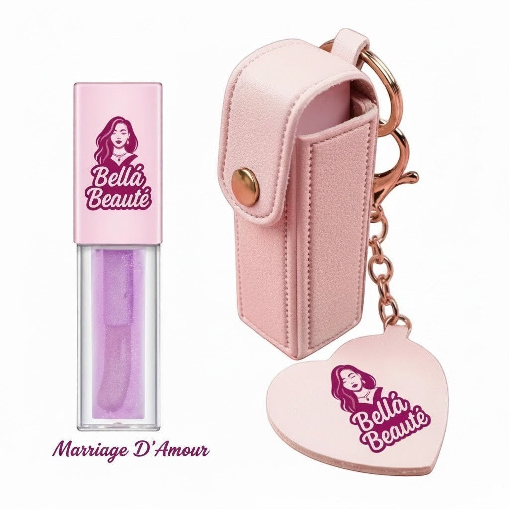 Bella Beauté light pink faux leather keychain with heart charm and lip oil holder, includes a shimmering lavender lip oil.