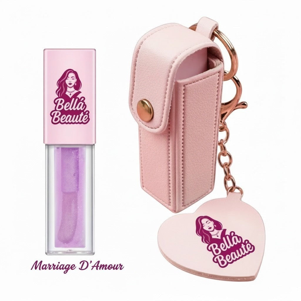 Bella Beauté pink leather lip oil keychain with a heart-shaped mirror and a lavender-tinted lip oil.
