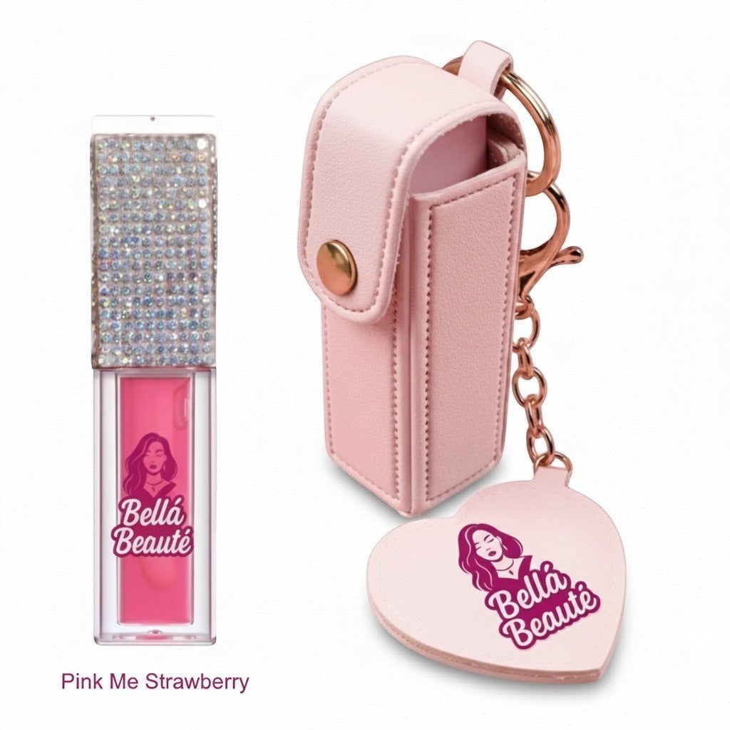 Bella Beauté pink lip oil with rhinestone-covered cap and keychain holder with heart charm.