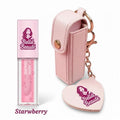 Bella Beauté pink lip oil keychain with mirror and Starberry flavored lip oil.