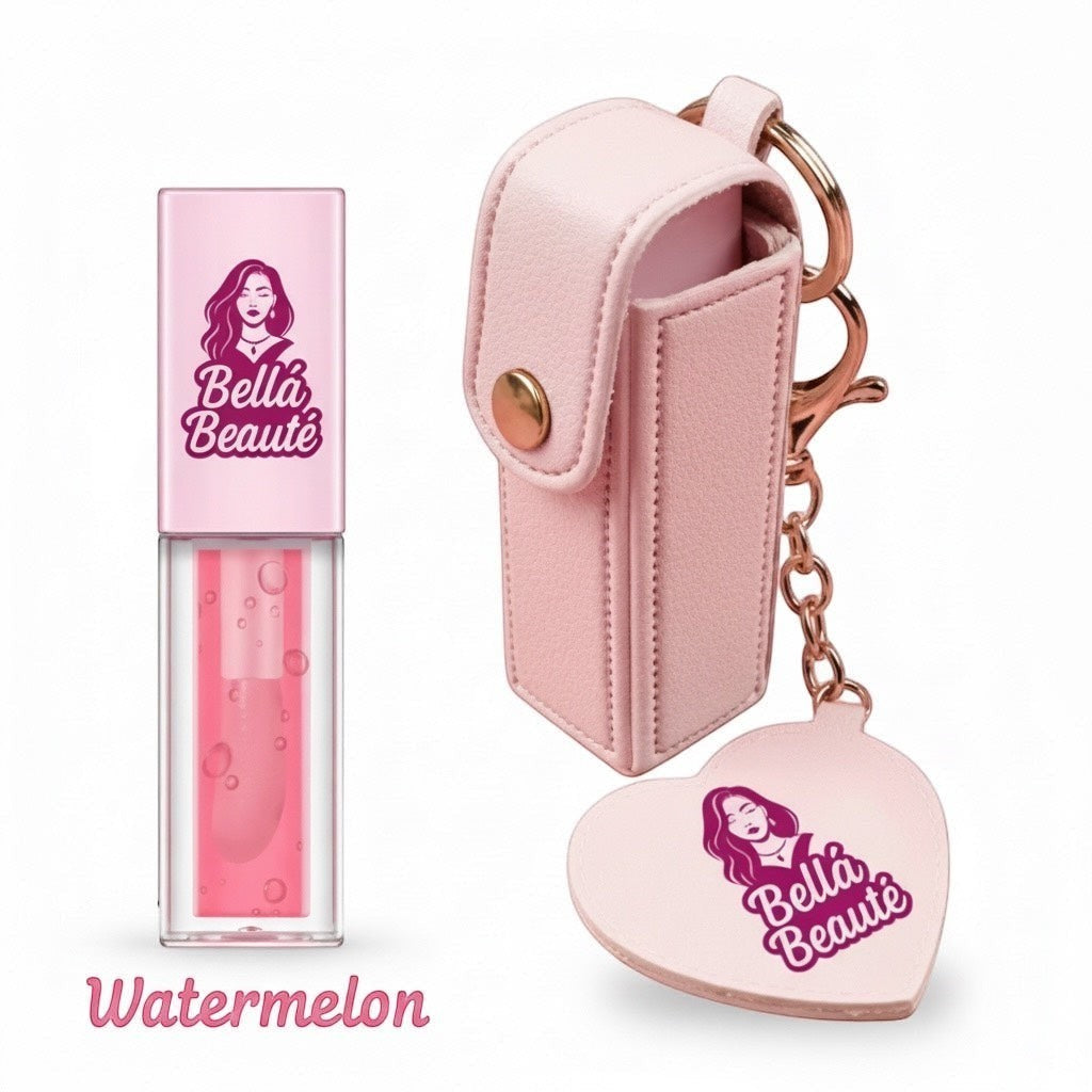 Bella Beauté pink lip oil keychain with a heart-shaped mirror charm and a watermelon flavored lip oil.