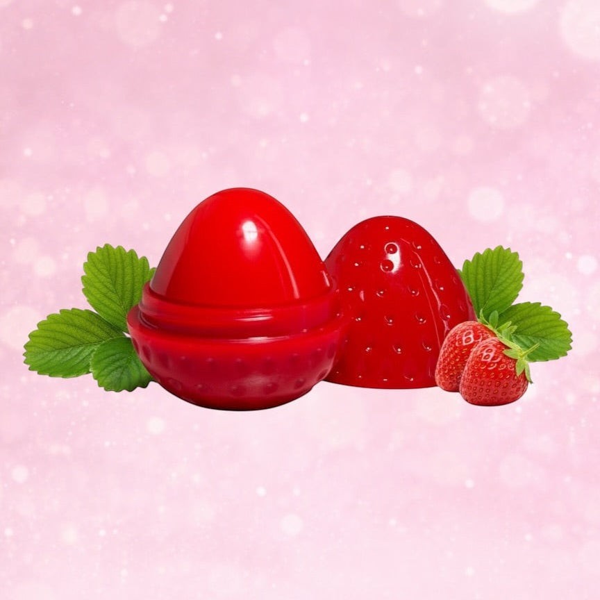 Bella Beauté strawberry-shaped lip balm tint in red, offering deep moisture and a natural red glow. Vegan-friendly.